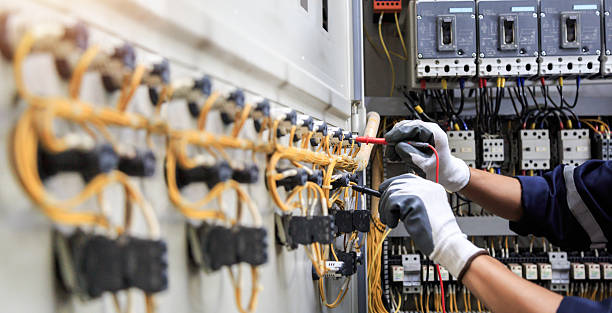 Professional Electrician technician working in Falls City, OR